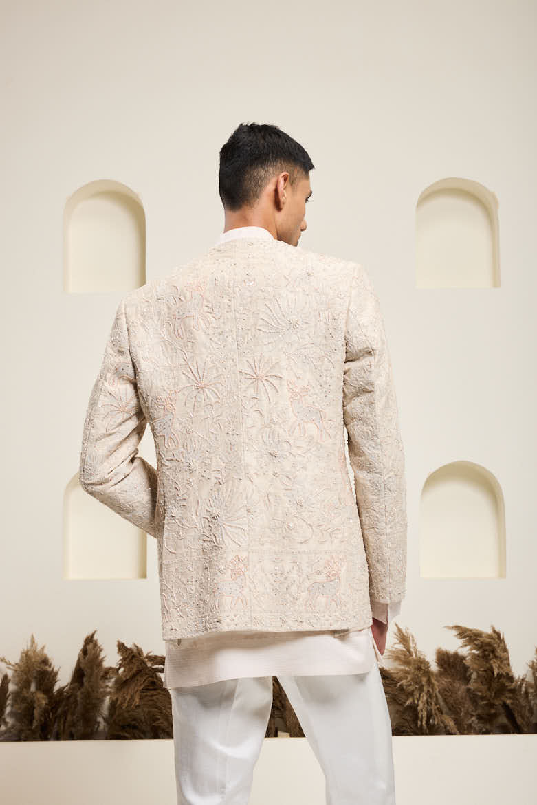 Dusty rose open bandhgala
with thread , sequins & pearl
work