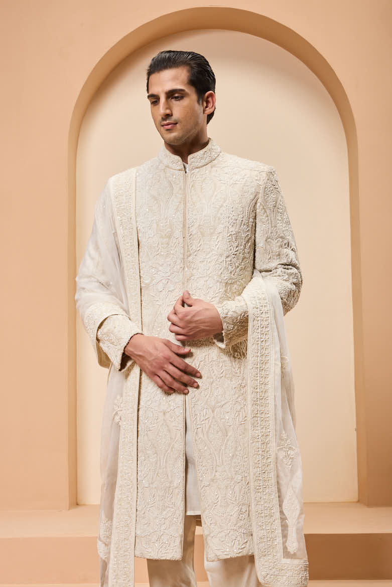 Ivory sherwani detailing with pearl,sequins and aplic work