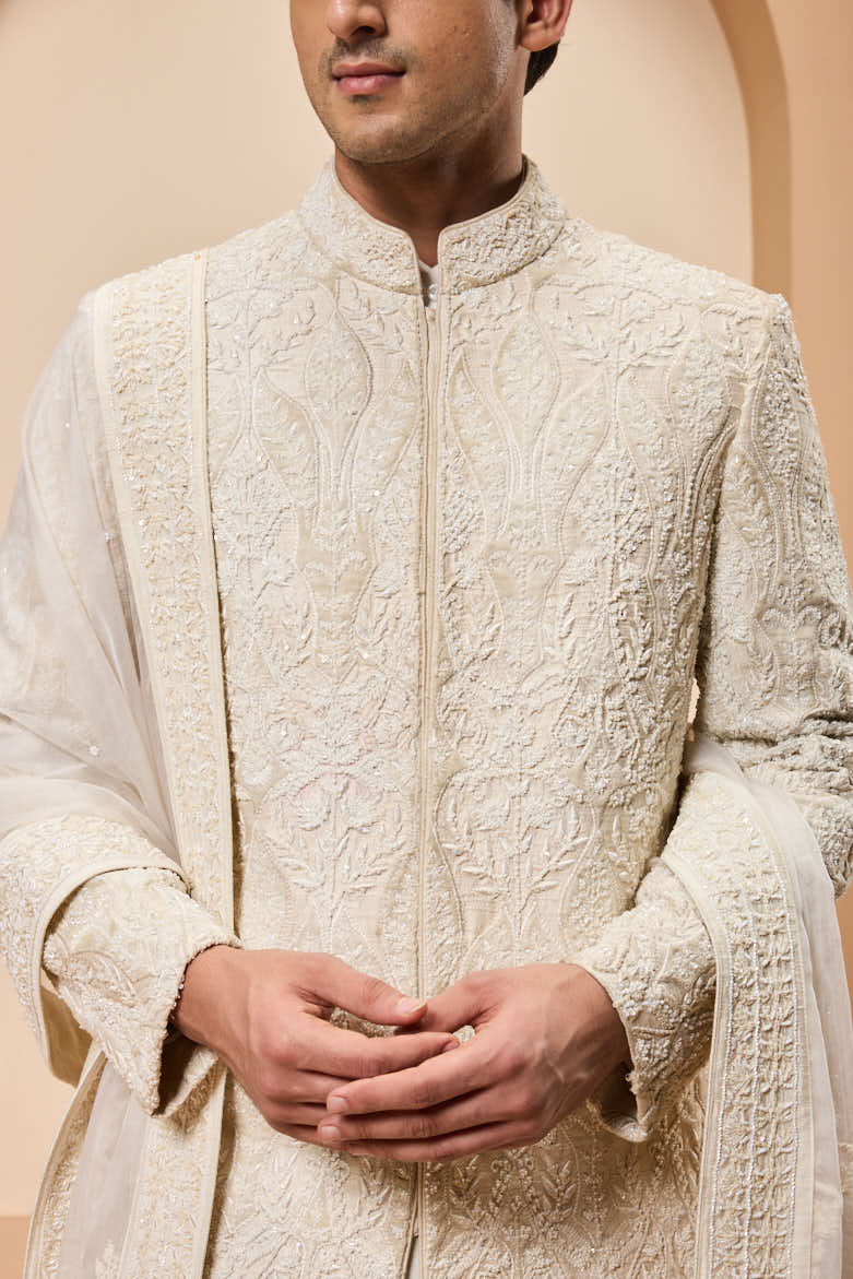 Ivory sherwani detailing with pearl,sequins and aplic work