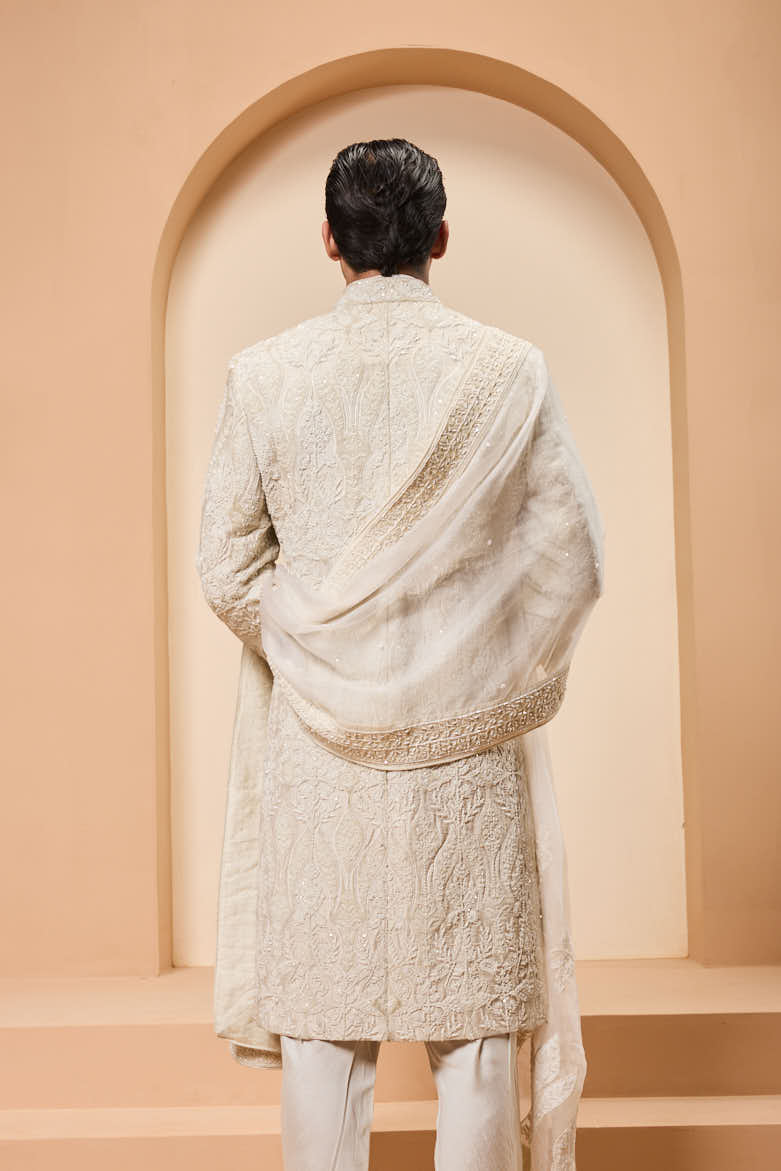 Ivory sherwani detailing with pearl,sequins and aplic work