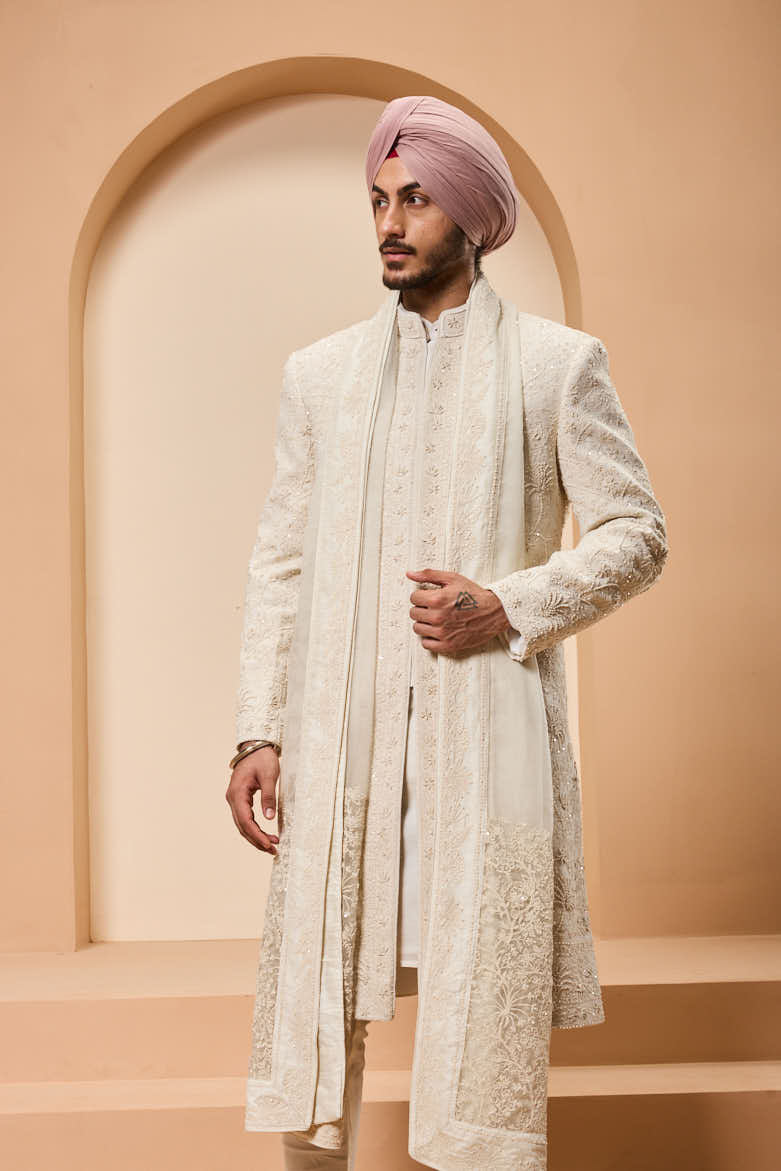 Ivory sherwani detailing with pearl,sequins and thread work