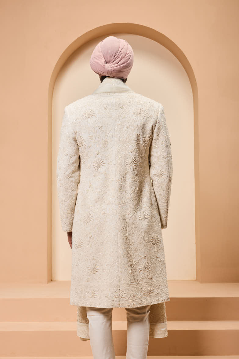 Ivory sherwani detailing with pearl,sequins and thread work