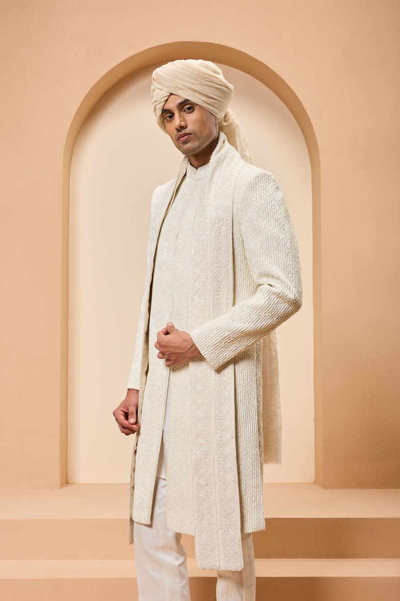 Ivory sherwani detailing with pearl,sequins and thread work