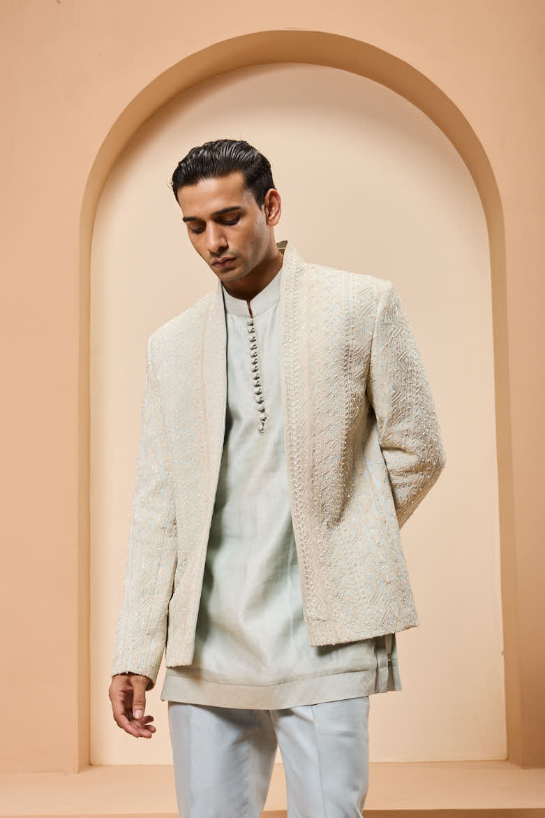 Powder blue open bandhgala
with thread , sequins & pearl
work
