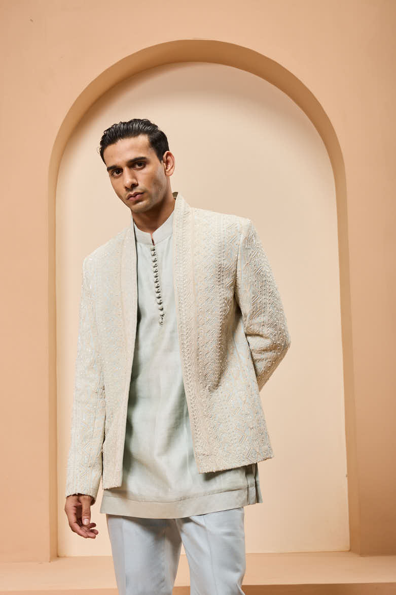 Powder blue open bandhgala
with thread , sequins & pearl
work