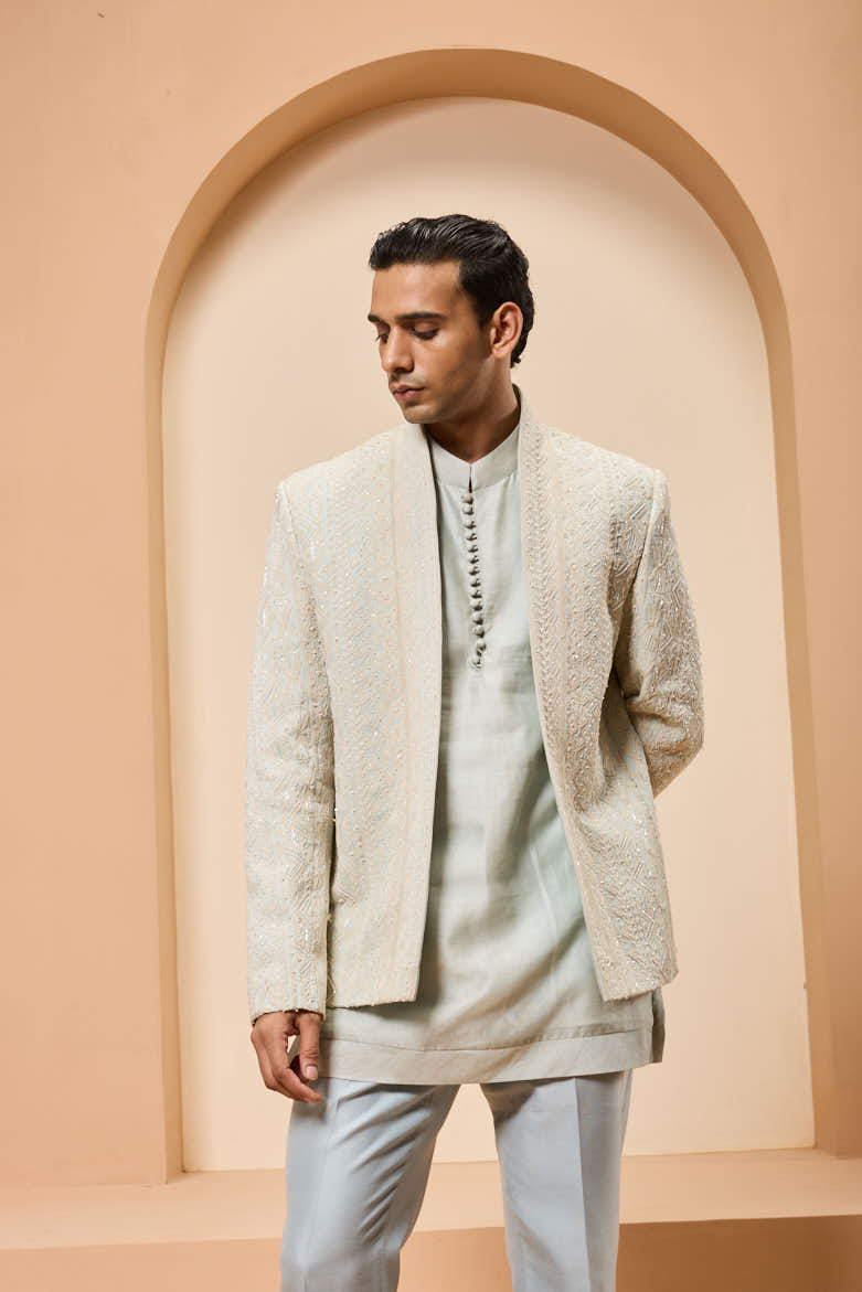 Powder blue open bandhgala
with thread , sequins & pearl
work