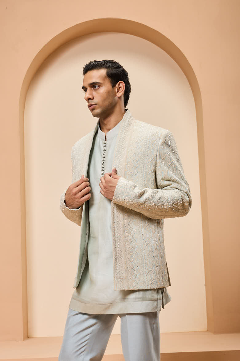 Powder blue open bandhgala
with thread , sequins & pearl
work