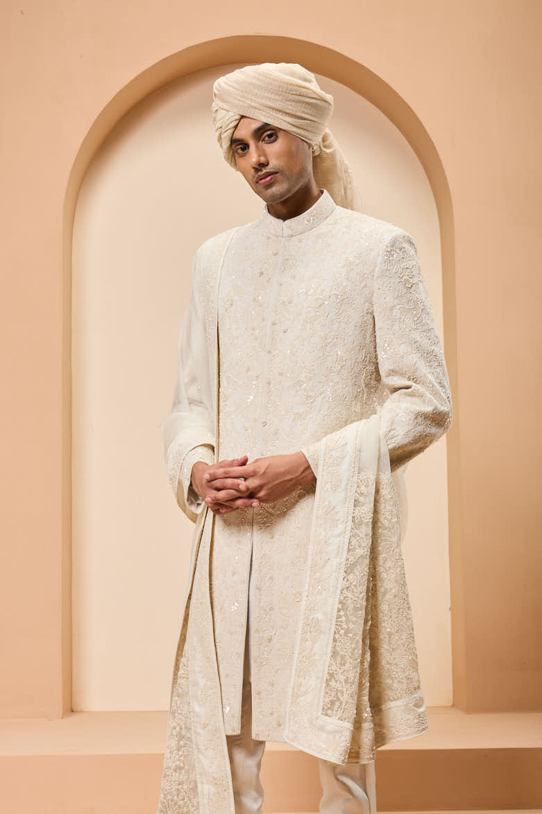 Ivory sherwani detailing with pearl,sequins and thread work