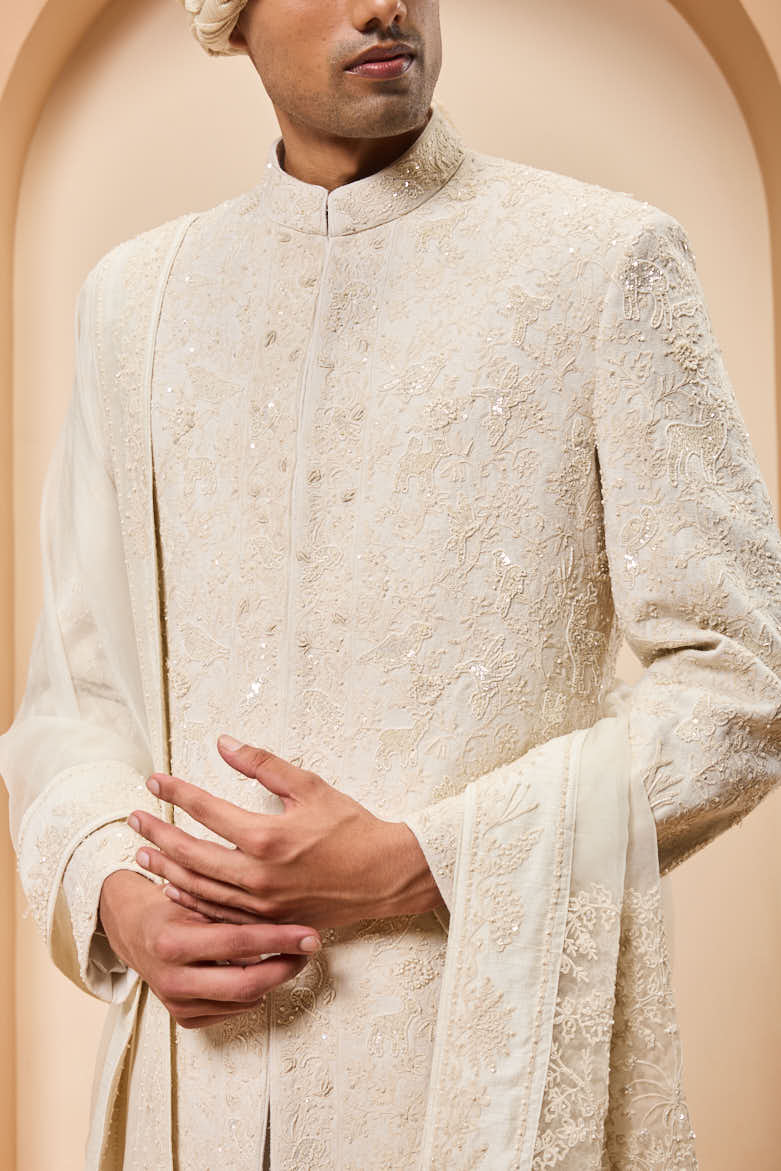 Ivory sherwani detailing with pearl,sequins and thread work