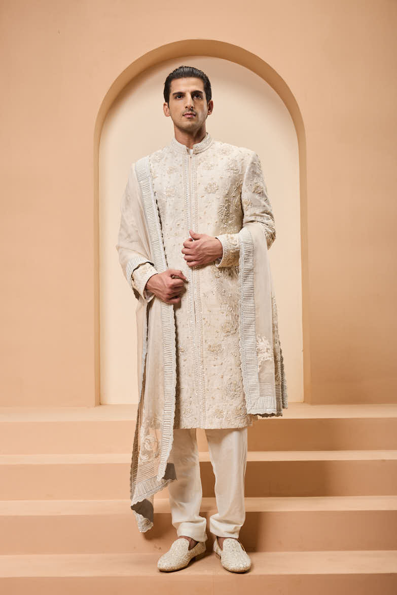 Ivory sherwani detailing with pearl,sequins and thread work