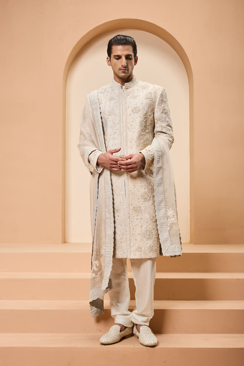 Ivory sherwani detailing with pearl,sequins and thread work