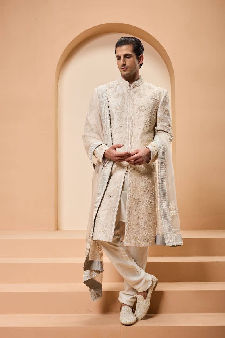 Ivory sherwani detailing with pearl,sequins and thread work