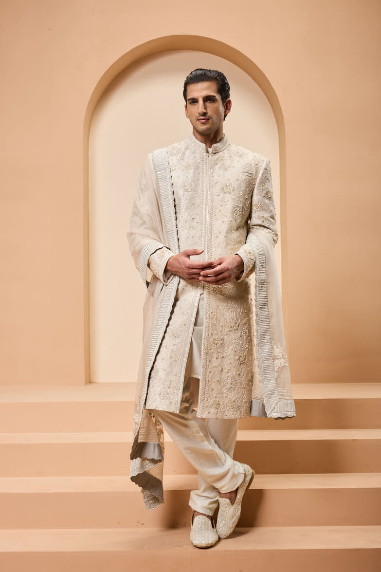 Ivory sherwani detailing with pearl,sequins and thread work