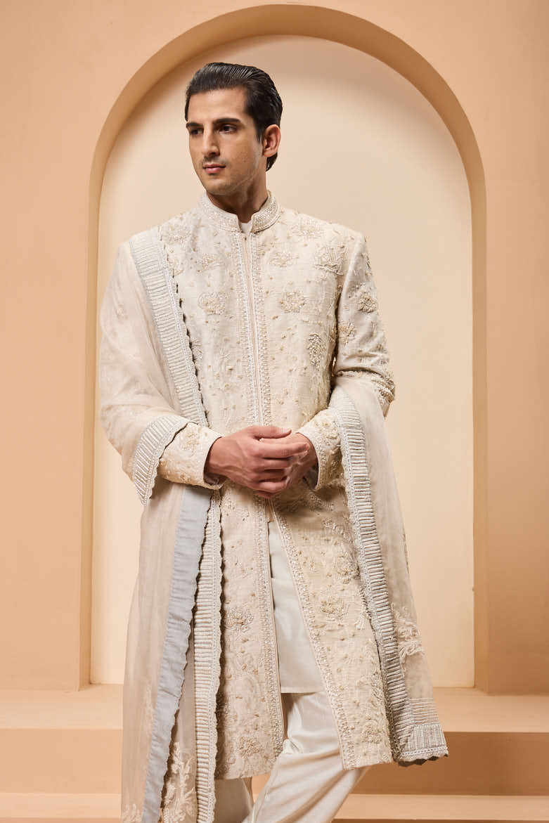 Ivory sherwani detailing with pearl,sequins and thread work