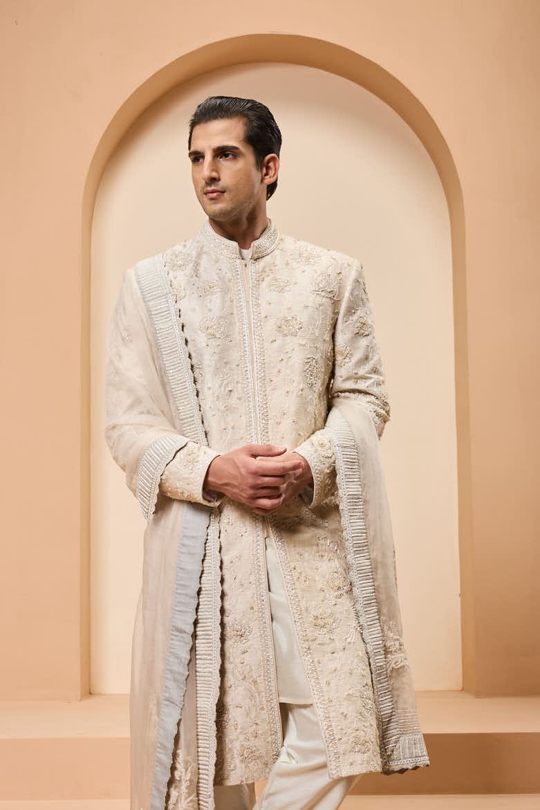 Ivory sherwani detailing with pearl,sequins and thread work