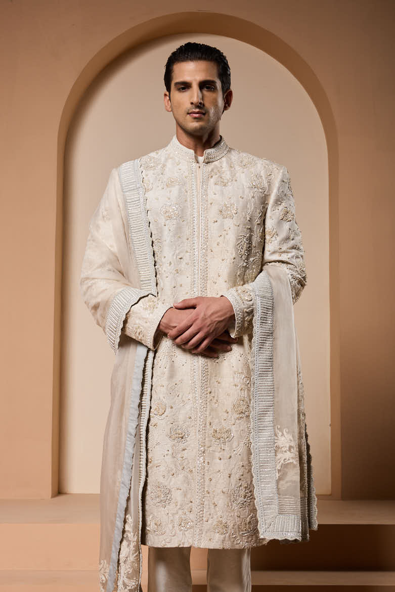 Ivory sherwani detailing with pearl,sequins and thread work