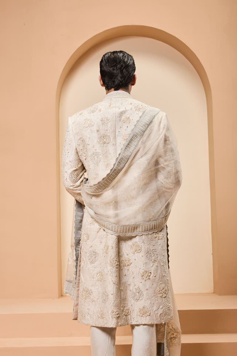 Ivory sherwani detailing with pearl,sequins and thread work