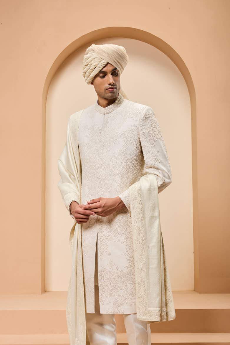 Ivory sherwani detailing with pearl,sequins and thread work
