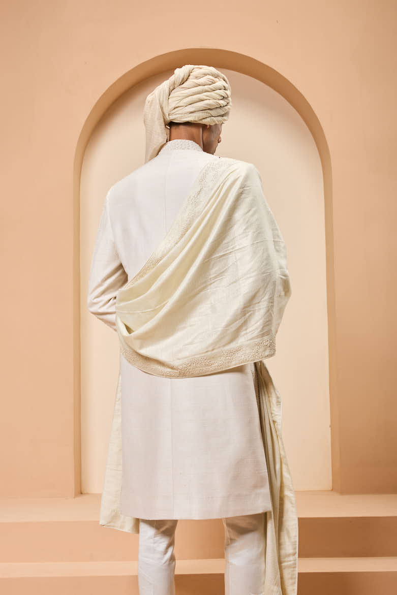 Ivory sherwani detailing with pearl,sequins and thread work