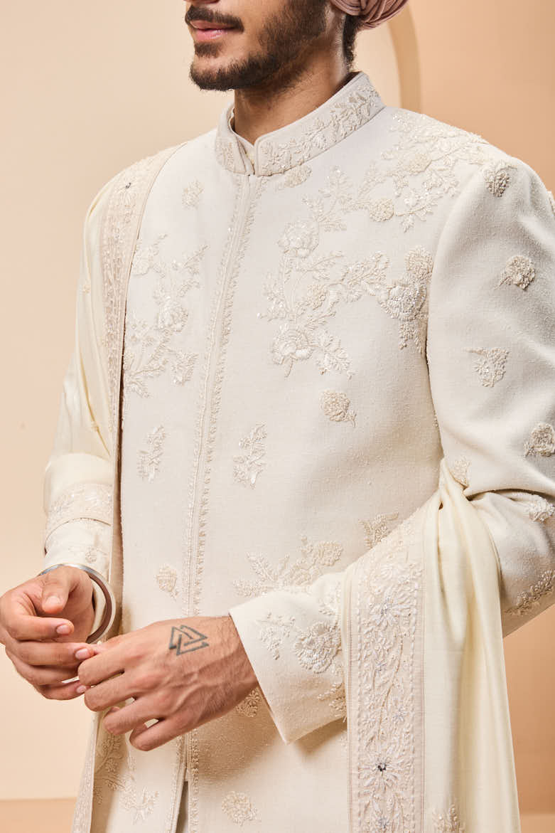 Ivory sherwani detailing with sequins and with thread work