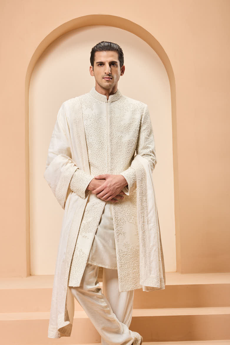 Ivory sherwani detailing with pearl,cutdana and thread work