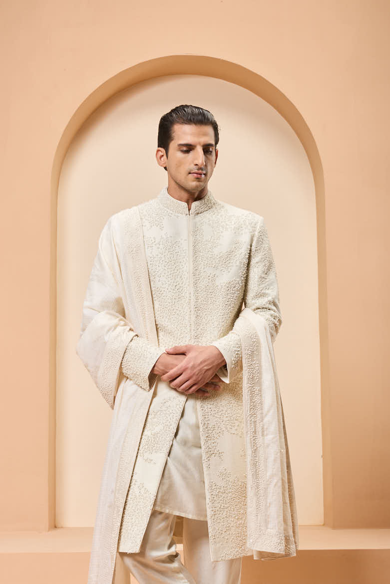 Ivory sherwani detailing with pearl,cutdana and thread work