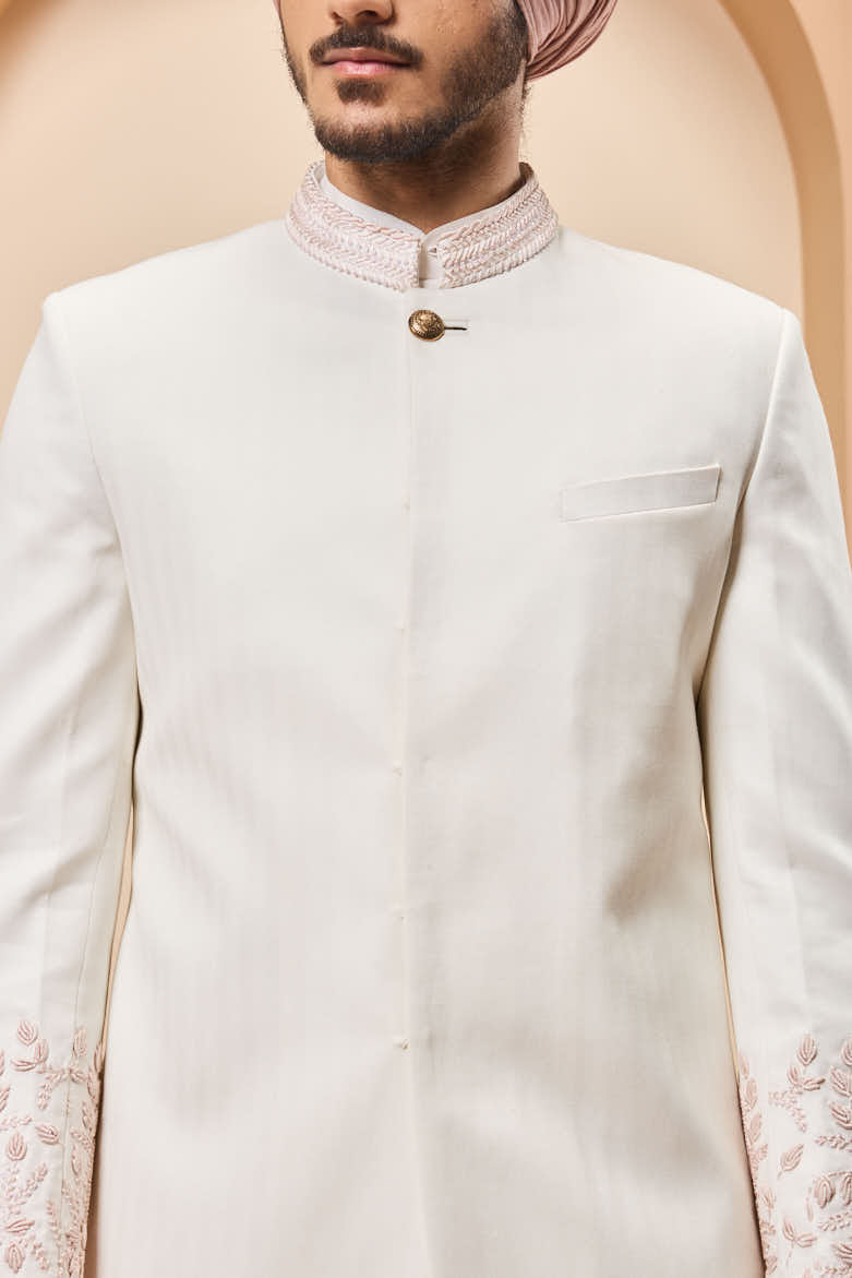 Ivory sherwani detailing with sequins and with thread work
