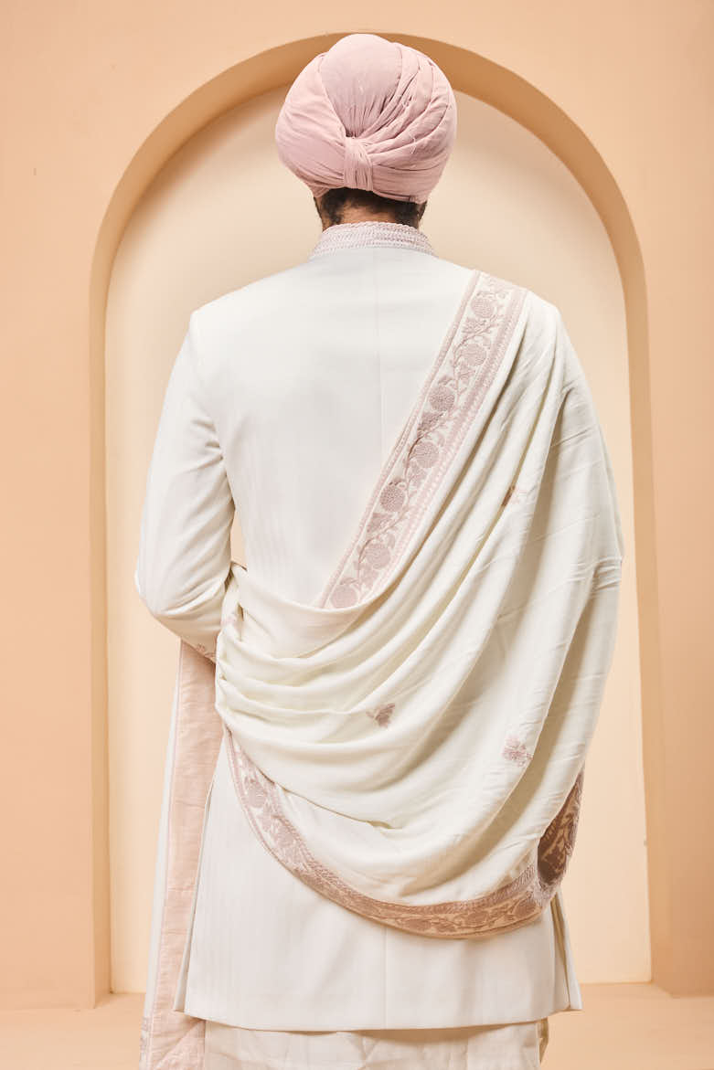 Ivory sherwani detailing with sequins and with thread work