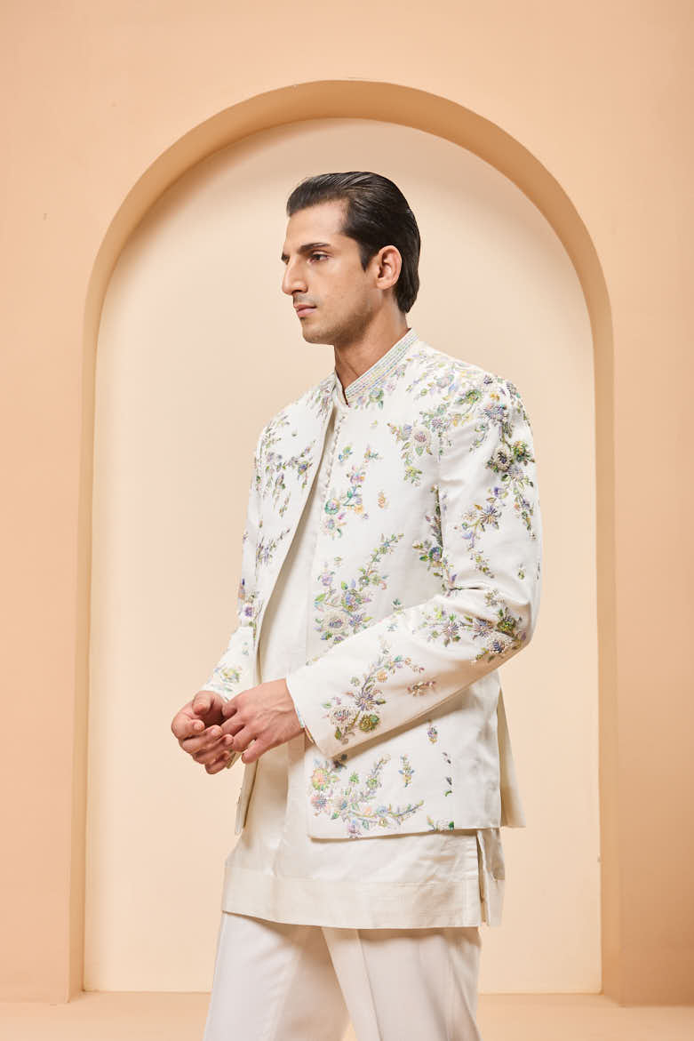 Ivory open bandhgala
with thread , sequins & pearl
work