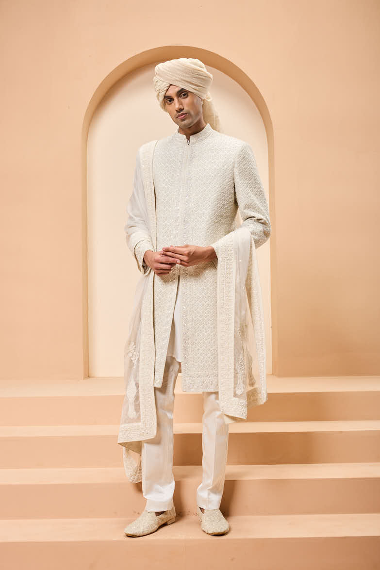 Ivory sherwani detailing with pearl, rainbow sequins and thread work