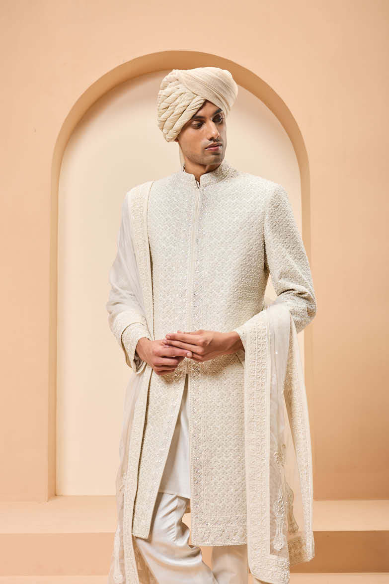 Ivory sherwani detailing with pearl, rainbow sequins and thread work