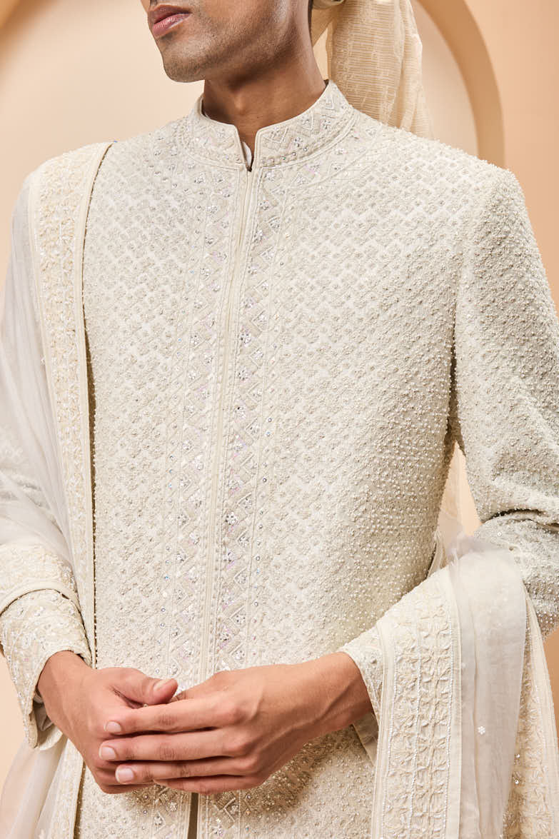 Ivory sherwani detailing with pearl, rainbow sequins and thread work