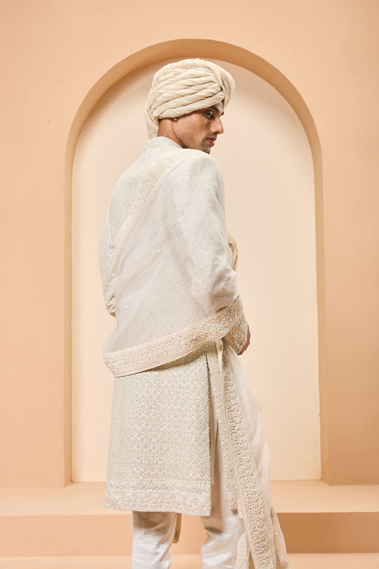 Ivory sherwani detailing with pearl, rainbow sequins and thread work