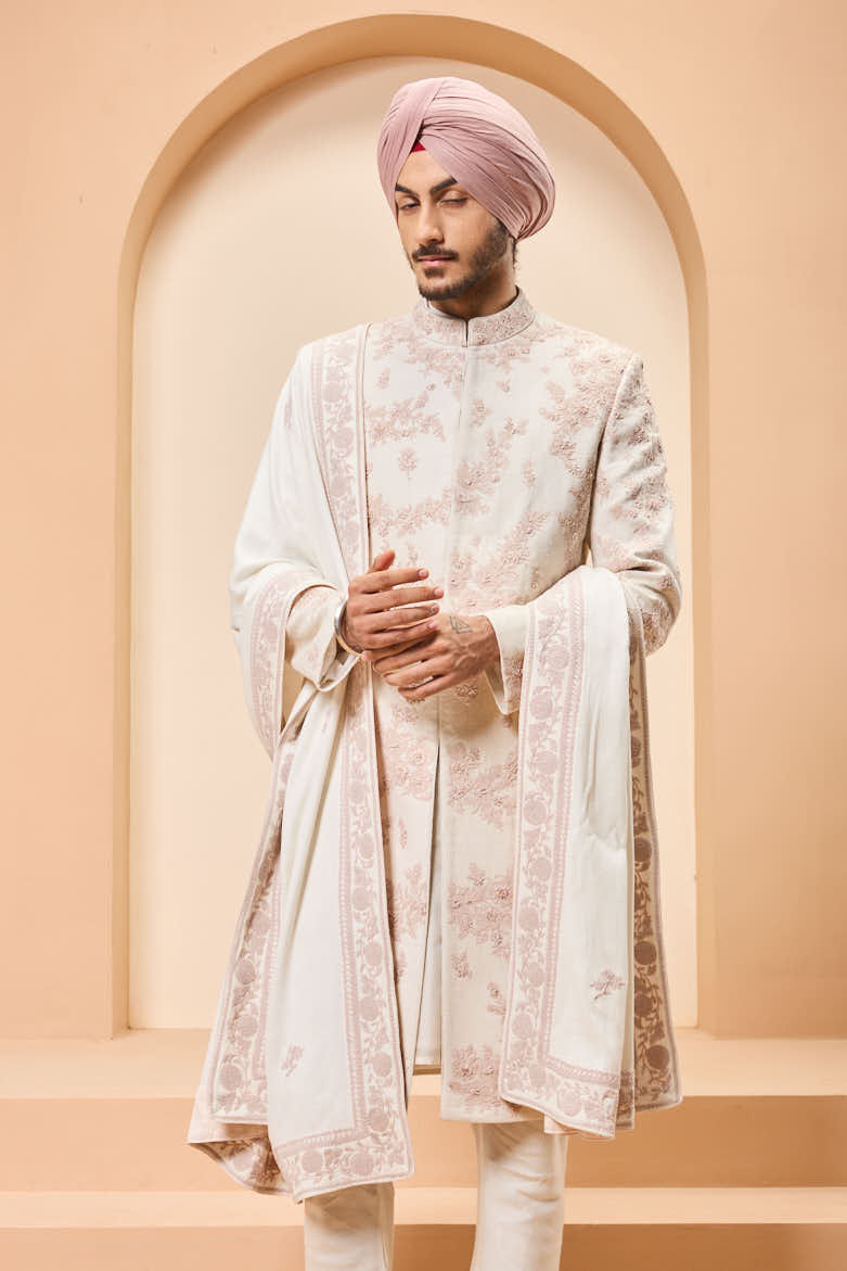 Ivory sherwani detailing with pearl,sequins and thread work