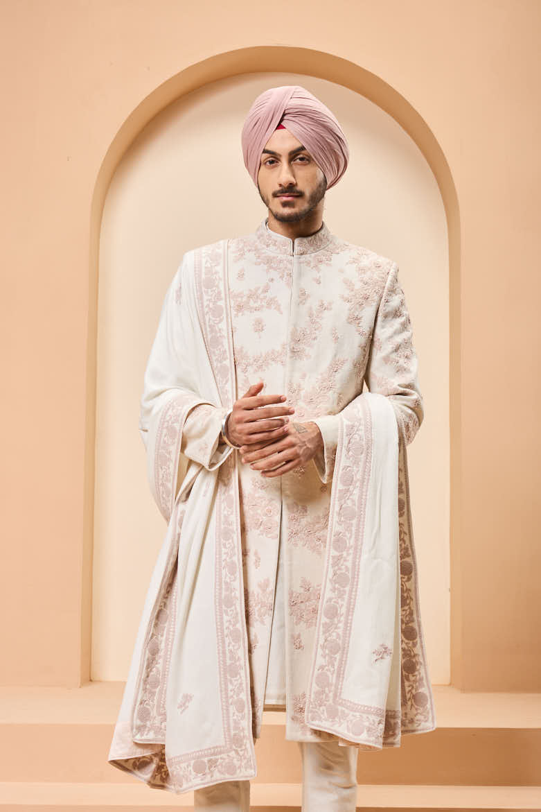Ivory sherwani detailing with pearl,sequins and thread work