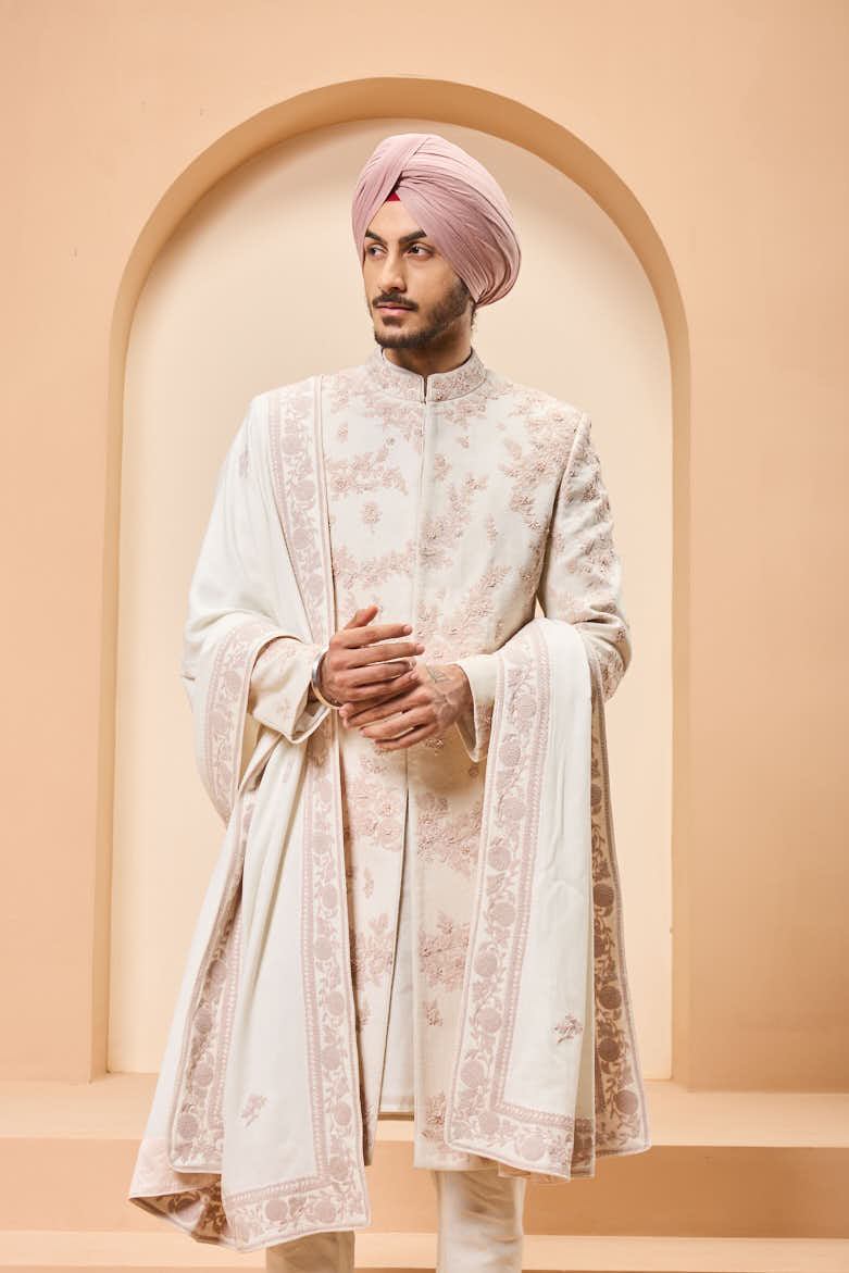 Ivory sherwani detailing with pearl,sequins and thread work