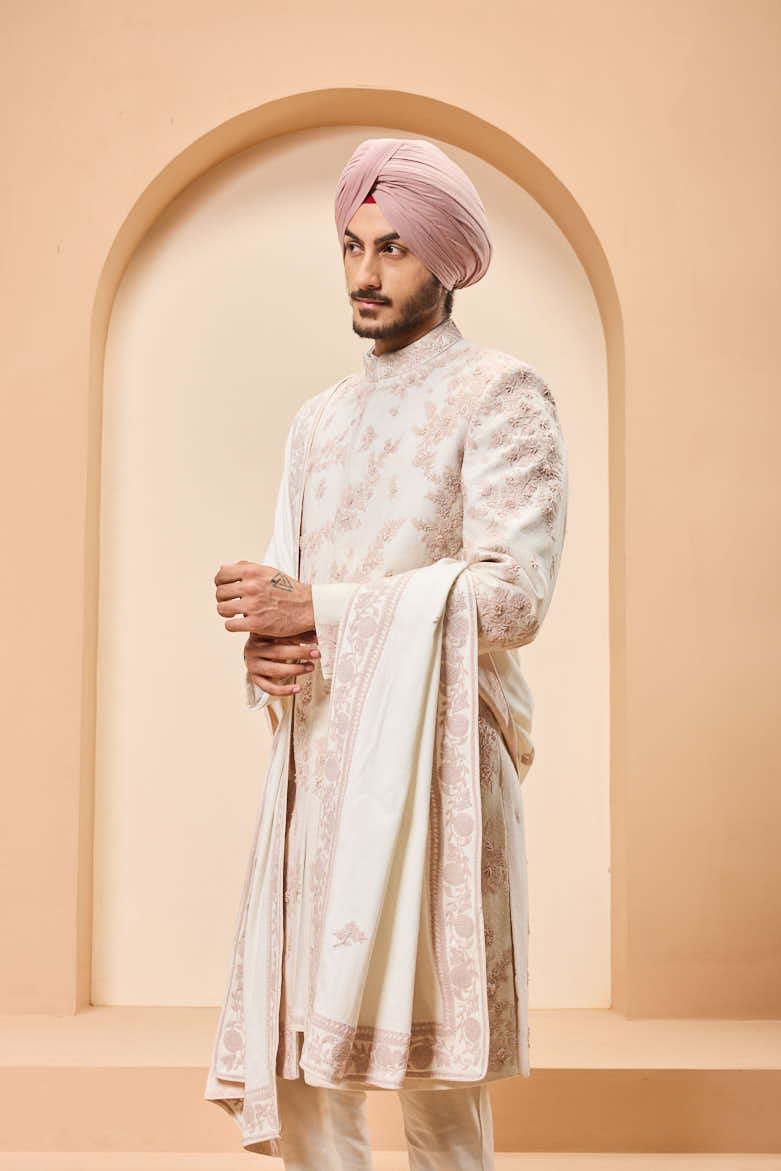 Ivory sherwani detailing with pearl,sequins and thread work