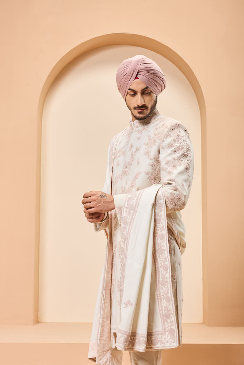 Ivory sherwani detailing with pearl,sequins and thread work
