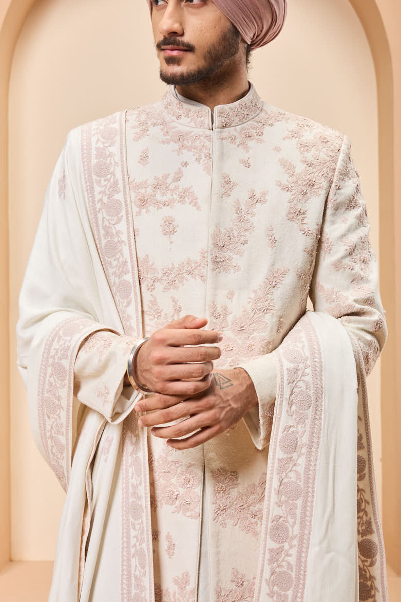 Ivory sherwani detailing with pearl,sequins and thread work