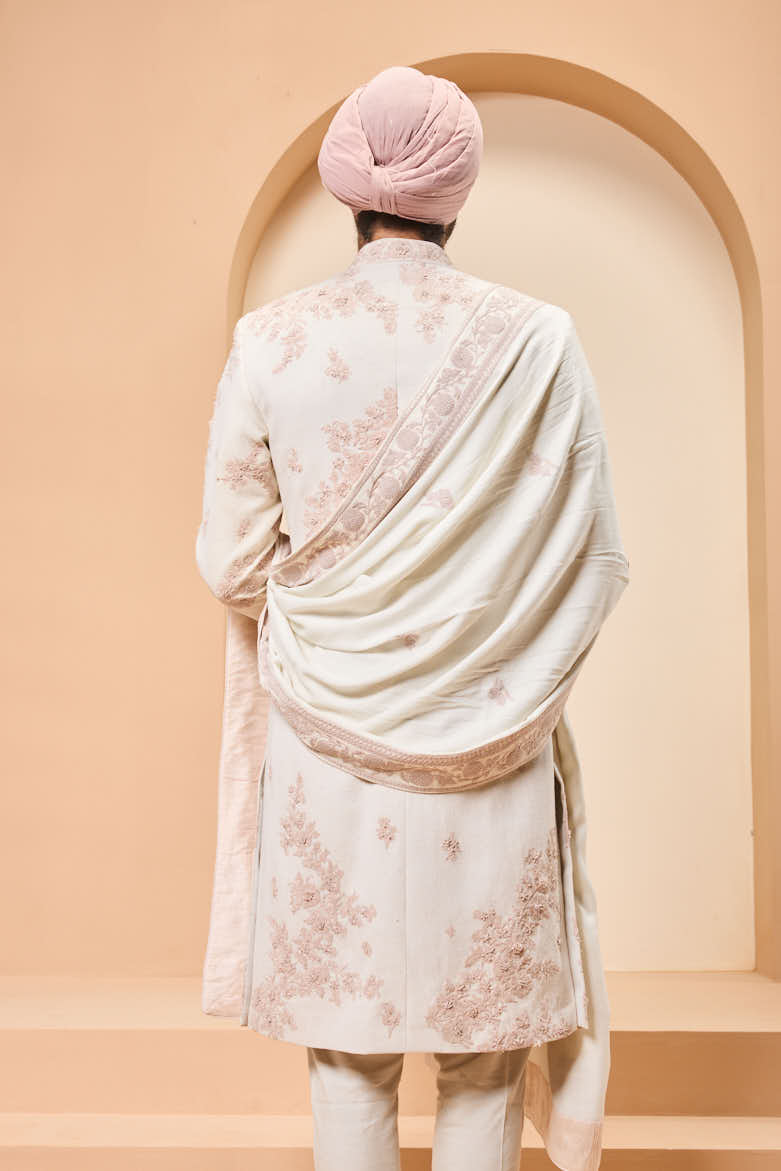 Ivory sherwani detailing with pearl,sequins and thread work