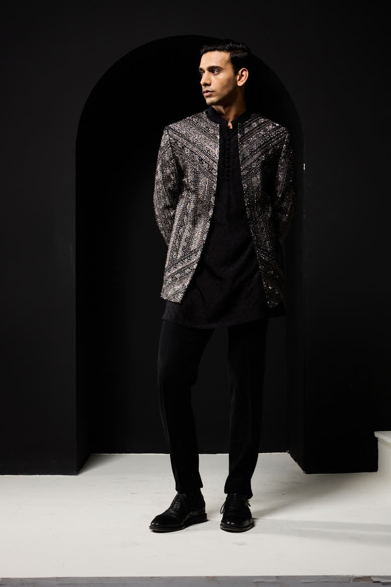 Black open bandhgala
with silver zari , sequins & pearl
work