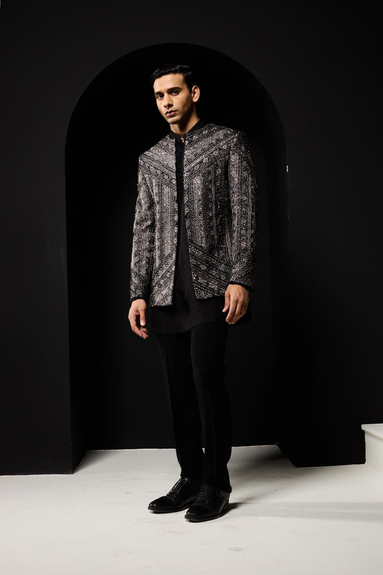 Black open bandhgala
with silver zari , sequins & pearl
work