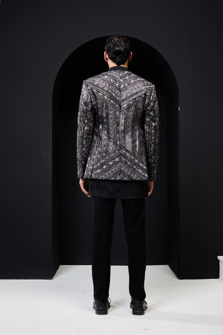 Black open bandhgala
with silver zari , sequins & pearl
work