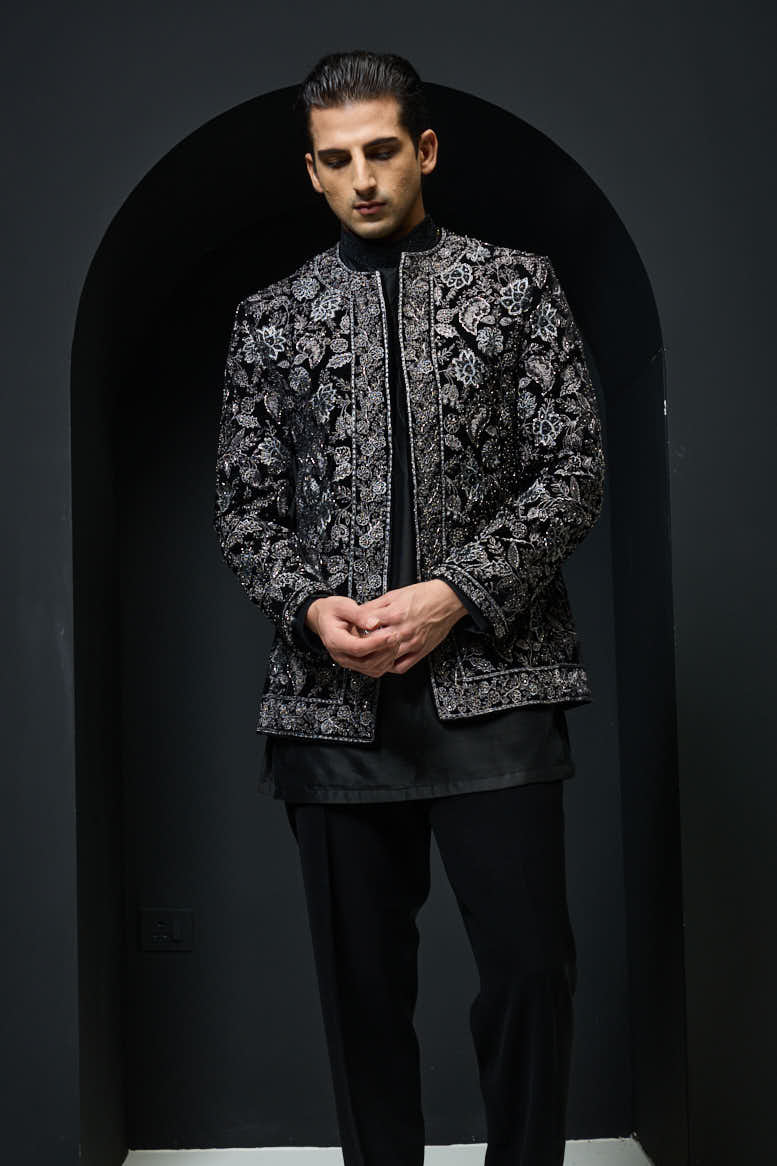 Black open bandhgala
with silver zari , sequins & pearl
work