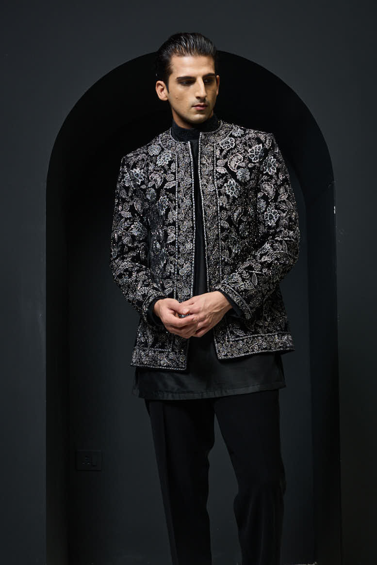 Black open bandhgala
with silver zari , sequins & pearl
work