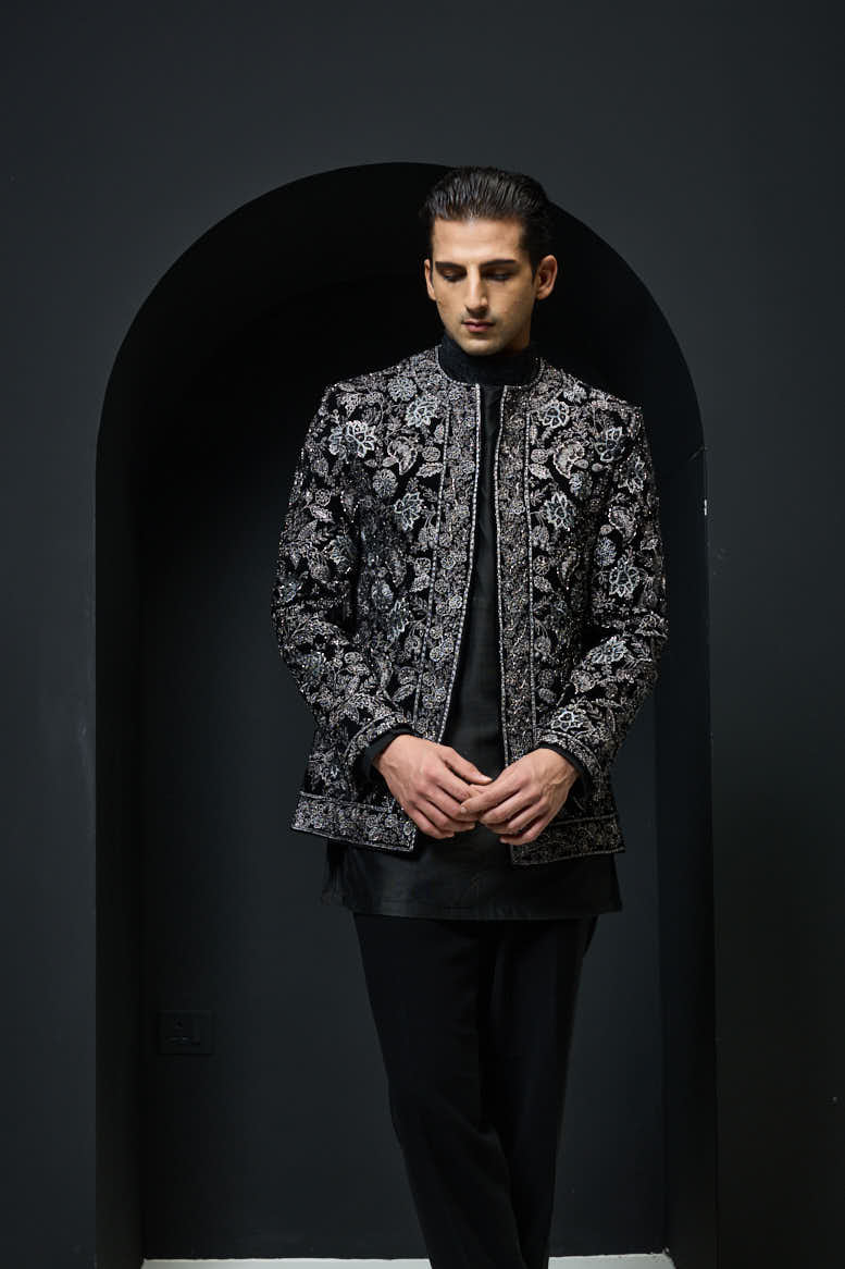 Black open bandhgala
with silver zari , sequins & pearl
work