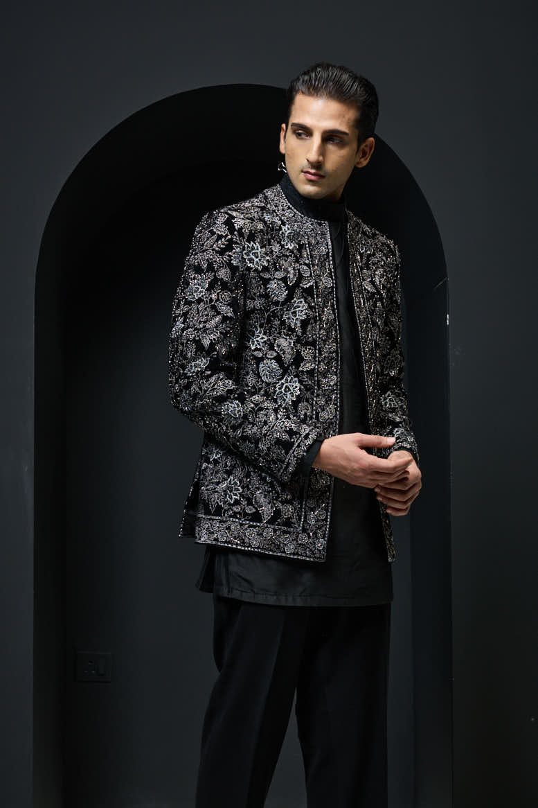 Black open bandhgala
with silver zari , sequins & pearl
work