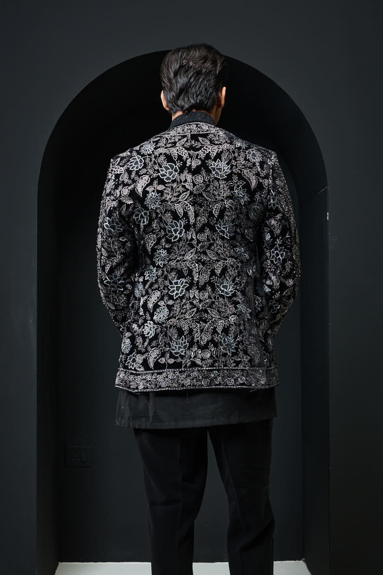 Black open bandhgala
with silver zari , sequins & pearl
work