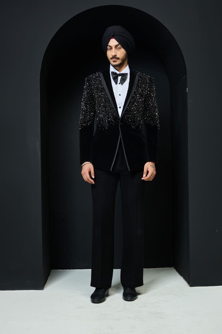 Black tuxedo highlighted with pearls and crystal