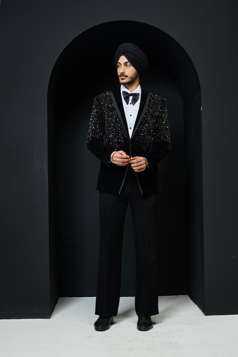 Black tuxedo highlighted with pearls and crystal